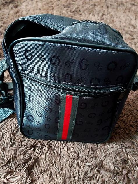 bolsa gucci masculina